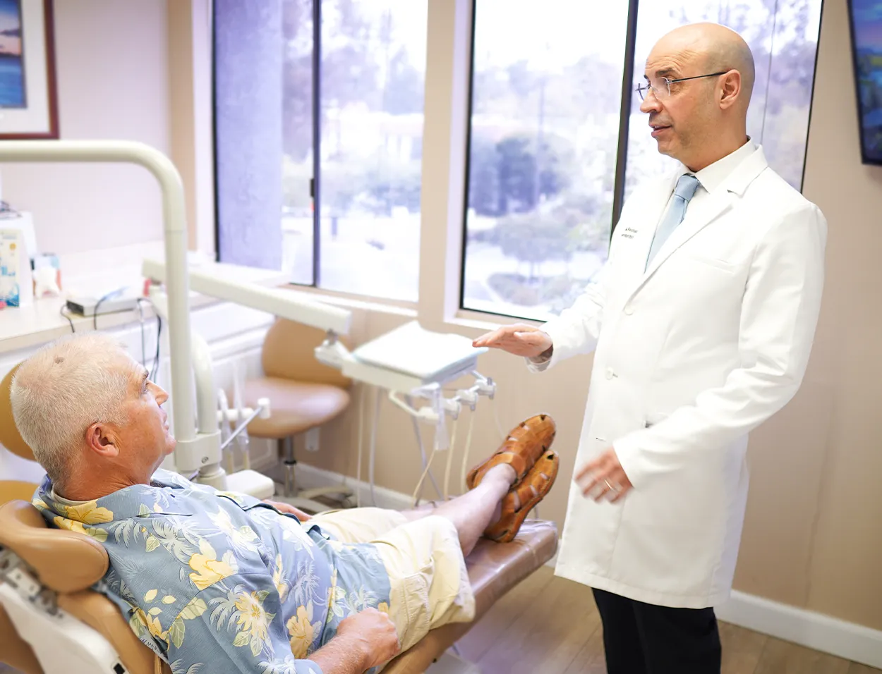 Dr. Reshad explaining gum diesease