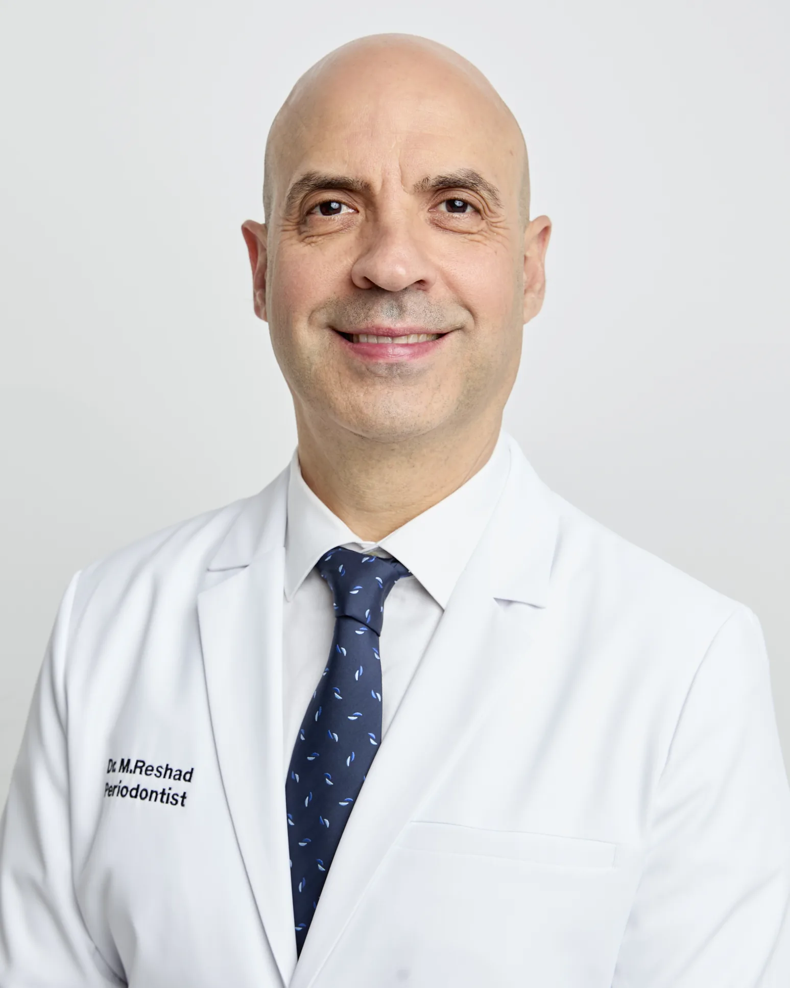 Dr. Moe Reshad, DDS, MSD