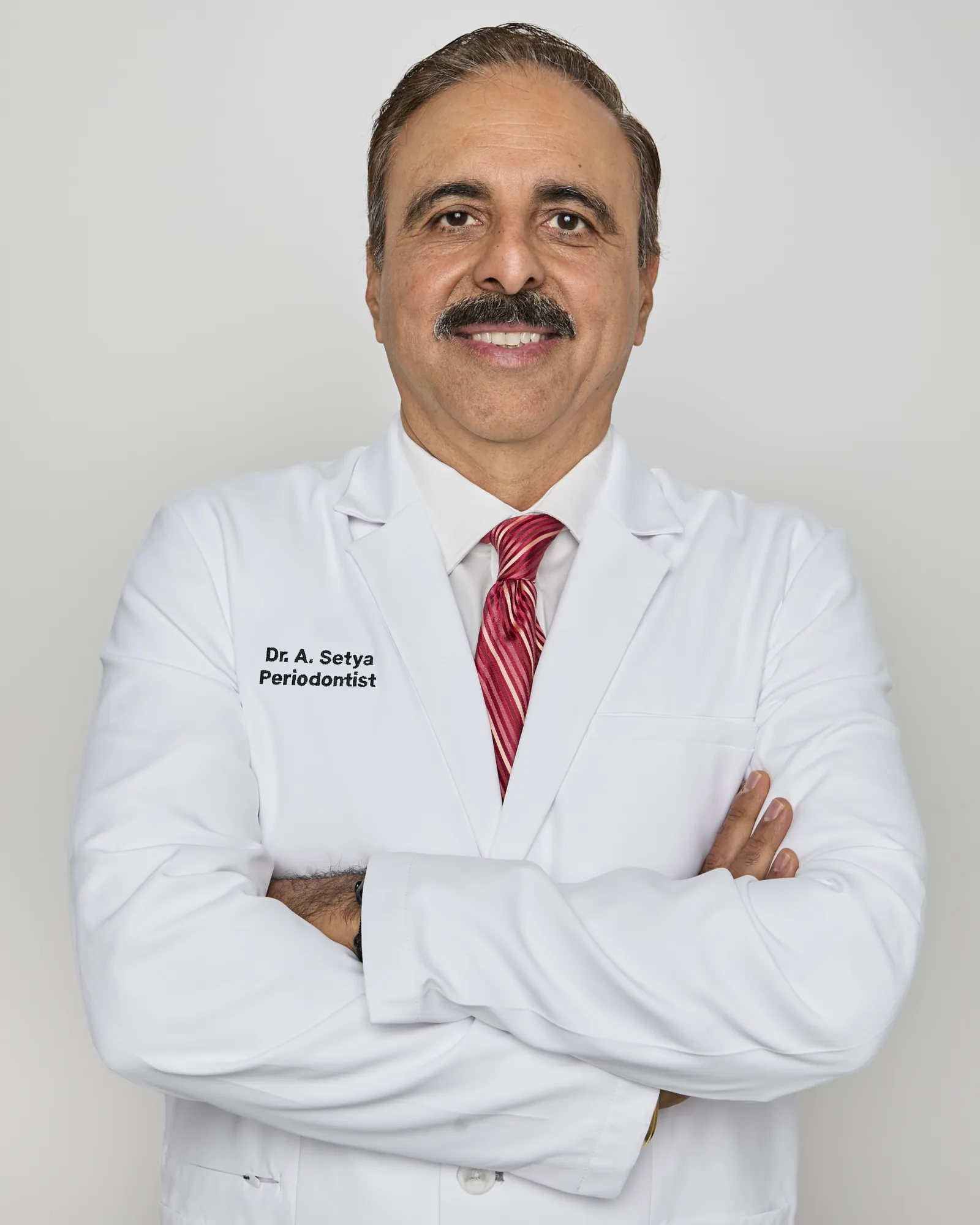 Dr. Ajay B. Setya, DDS, MSD