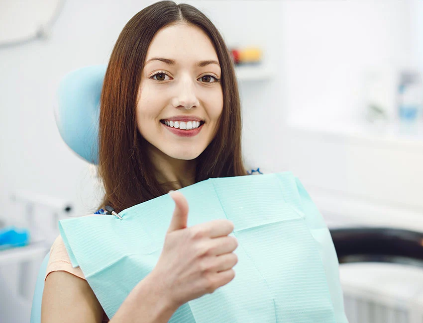 Happy patient at OC Perio & Implants Dental Group