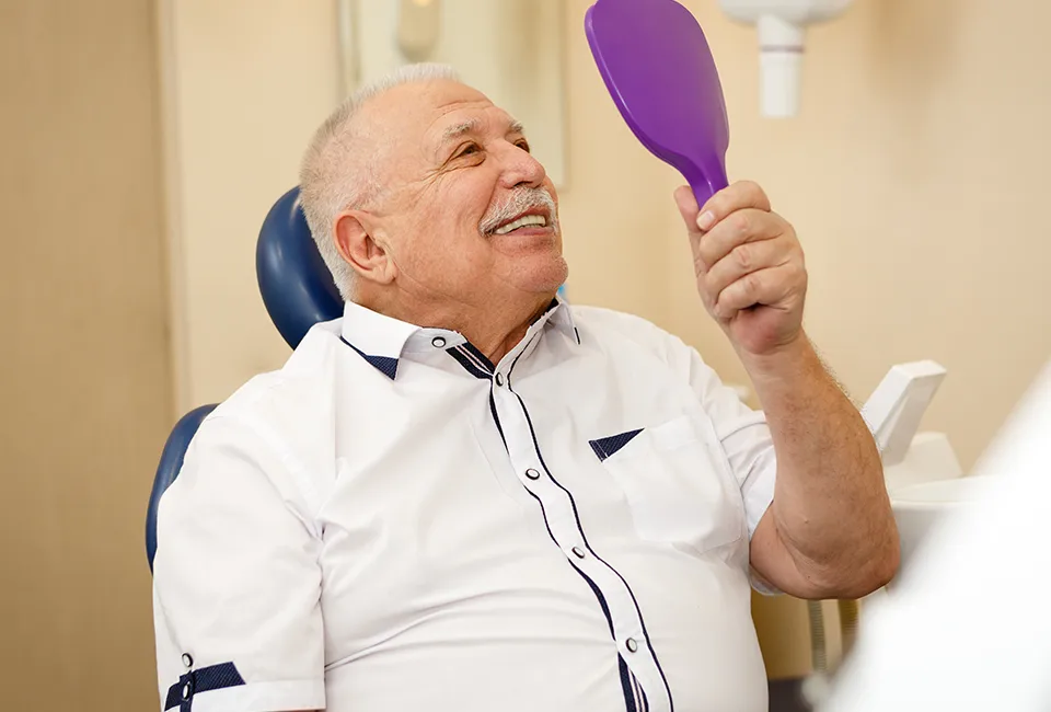 Patient with Dental Implants in Orange County, CA